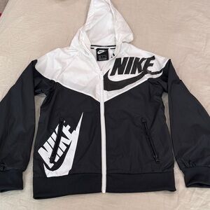 Nike Kids Black and White windbreaker size small. Never worn